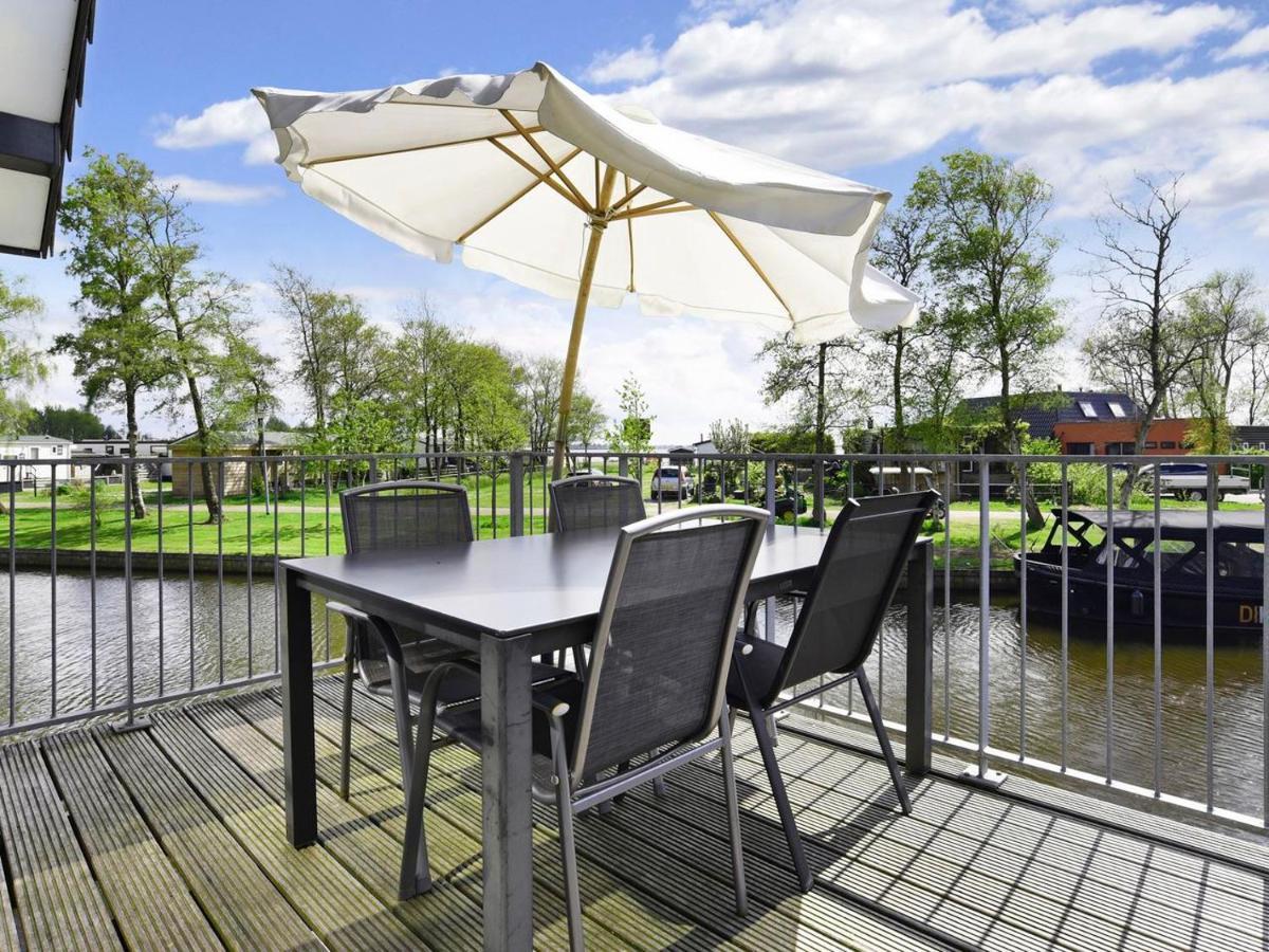 Отель Landal Waterpark Sneekermeer Терхерне Номер фото